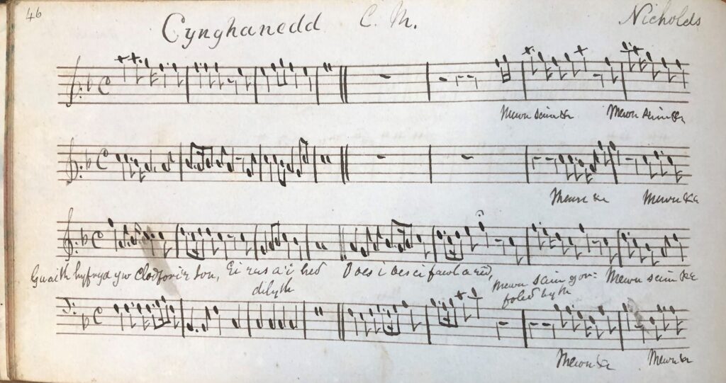 Llun du a gwyn o llyfr yn cynnwys sgoriau cerdd mewn llawysgrifen 